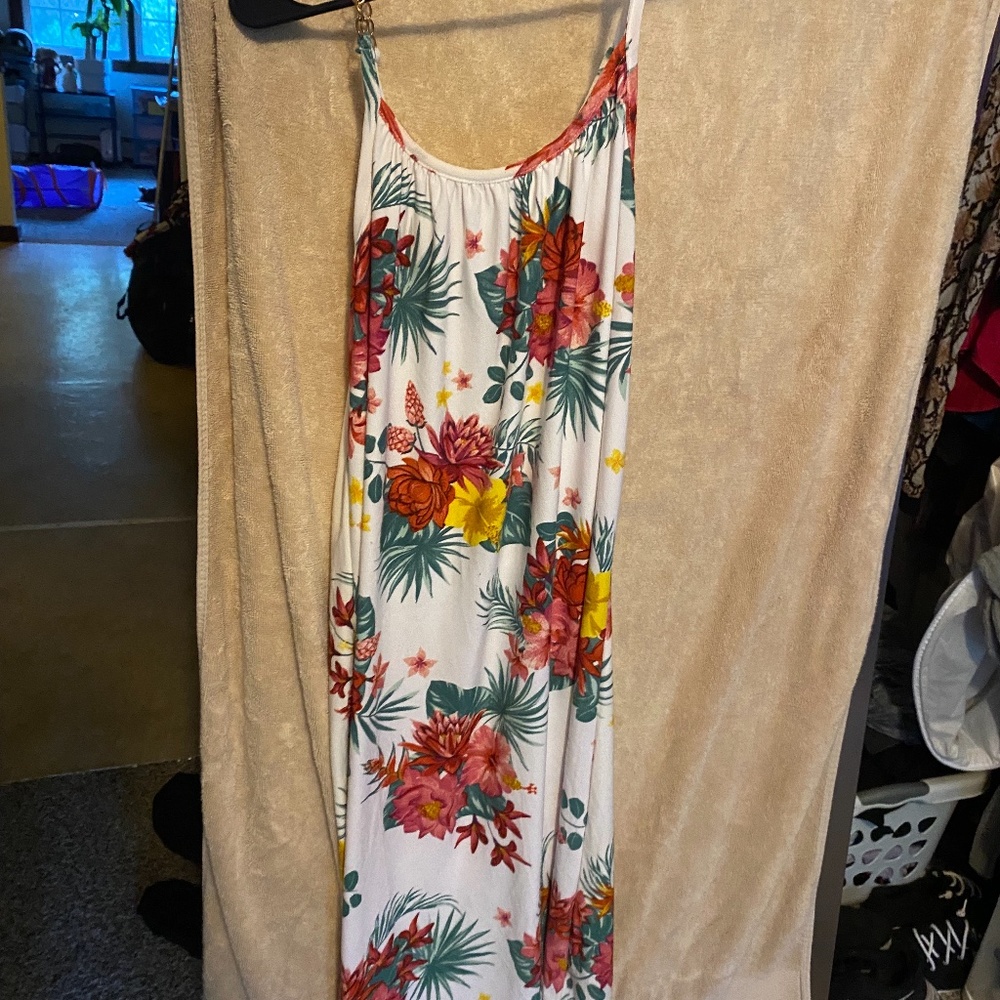 Woman’s white dress with red flowers